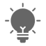 Light bulb icon on black background.